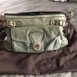 Coach handbag (gently used) added additional photos of the bottom